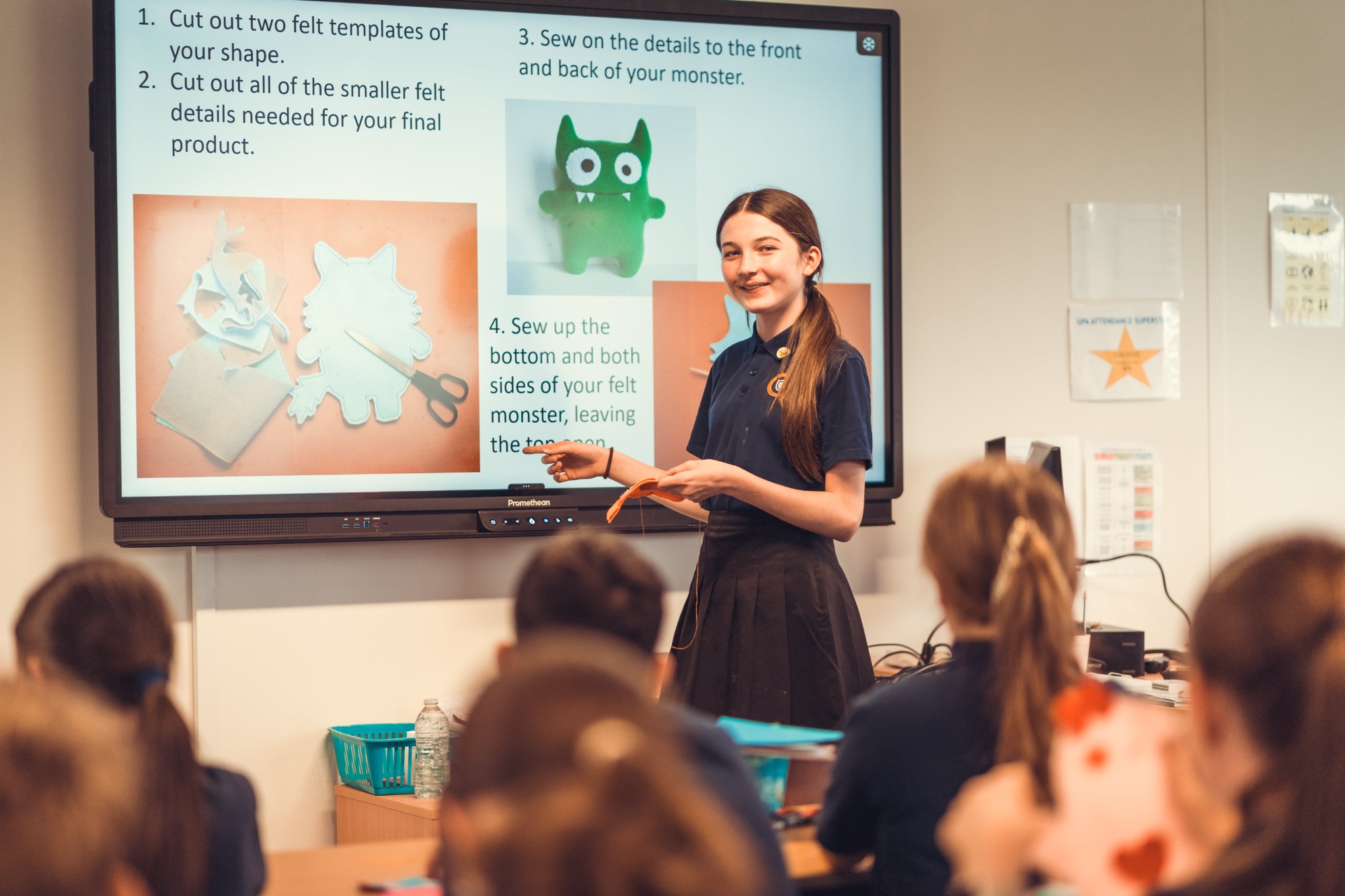 Child presenting infront of their class